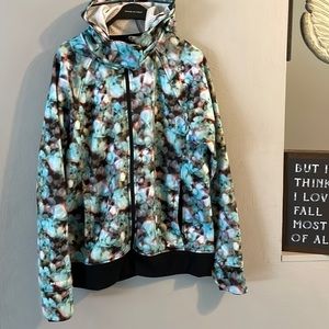 Woman’s UA storm size large jacket multi color